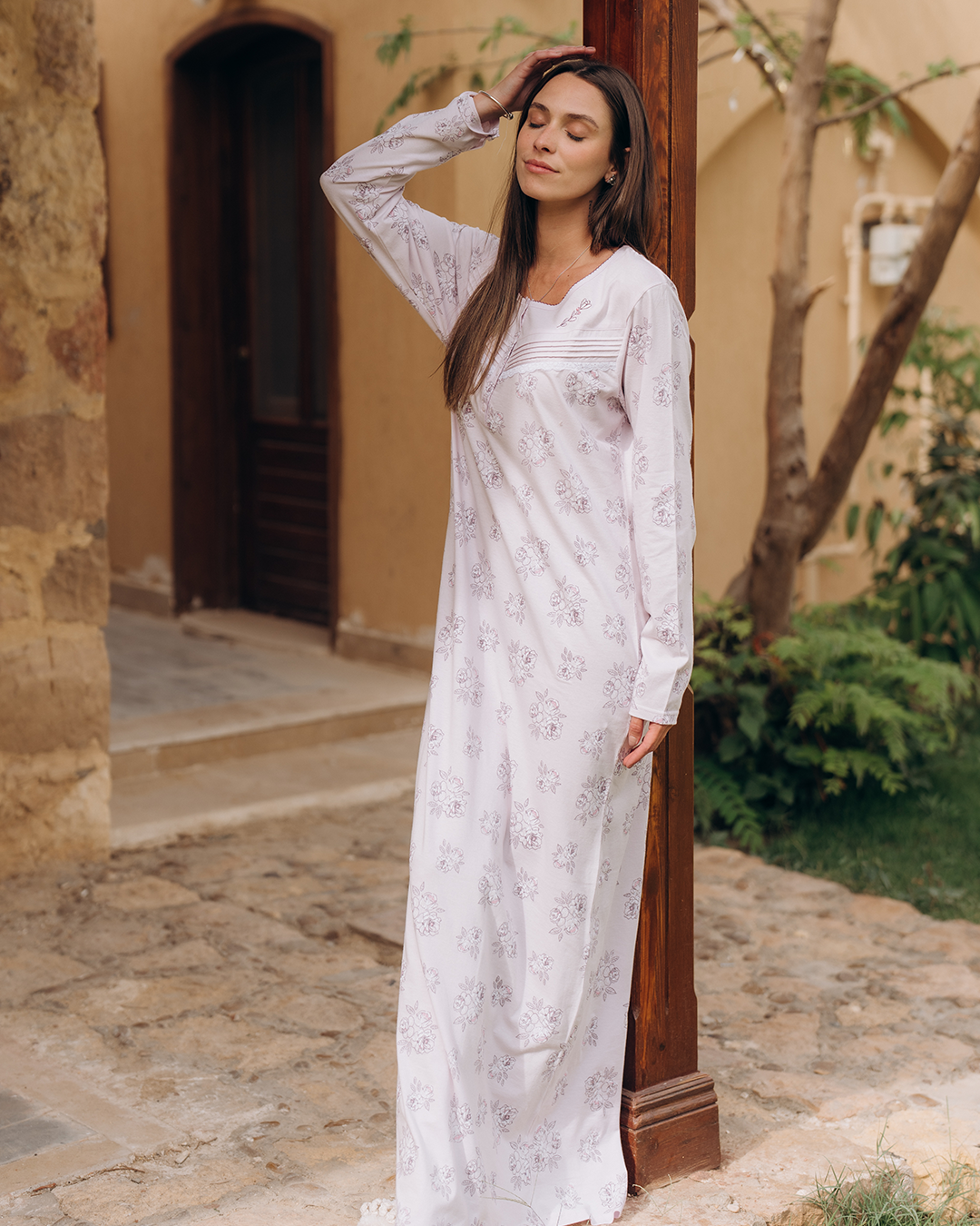 Women's nightgown with lace buttons and ruffles on the chest