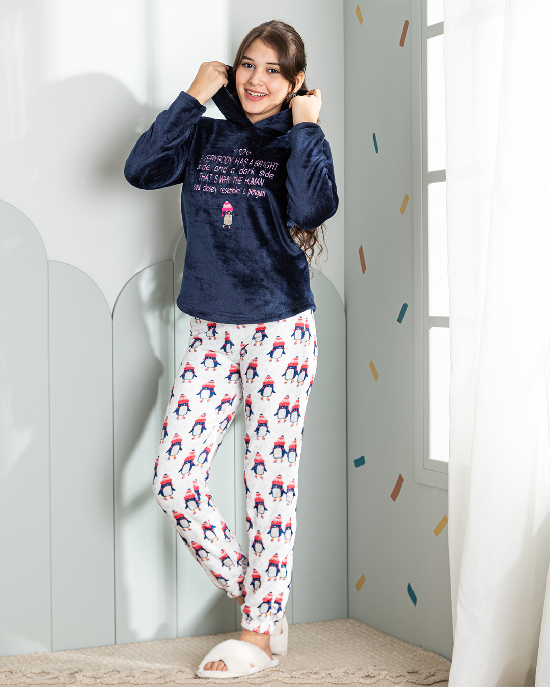  girls' pajamas are plush with a penguin
