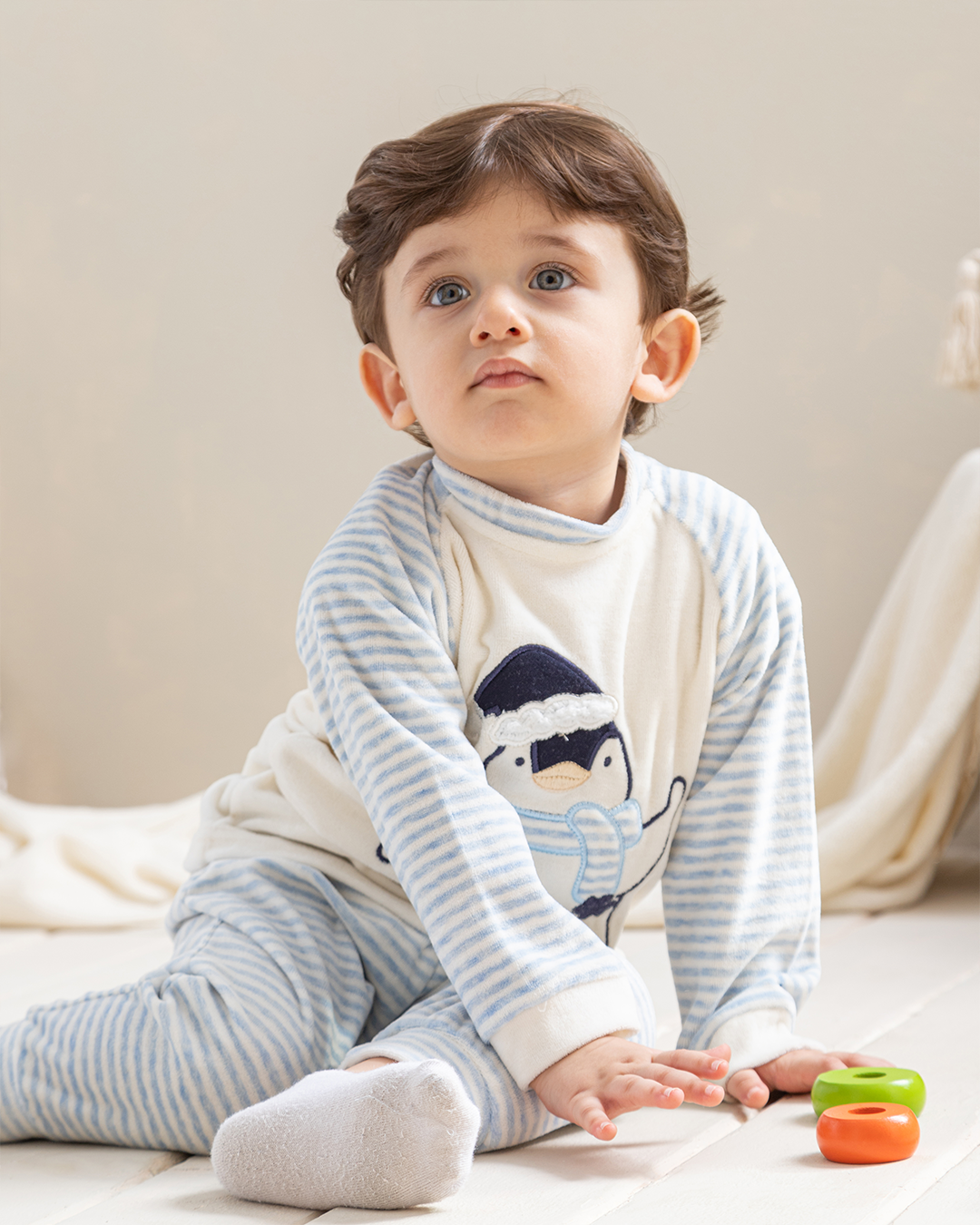 Merry Christmas baby boy's pajamas in a plush stripe penguin